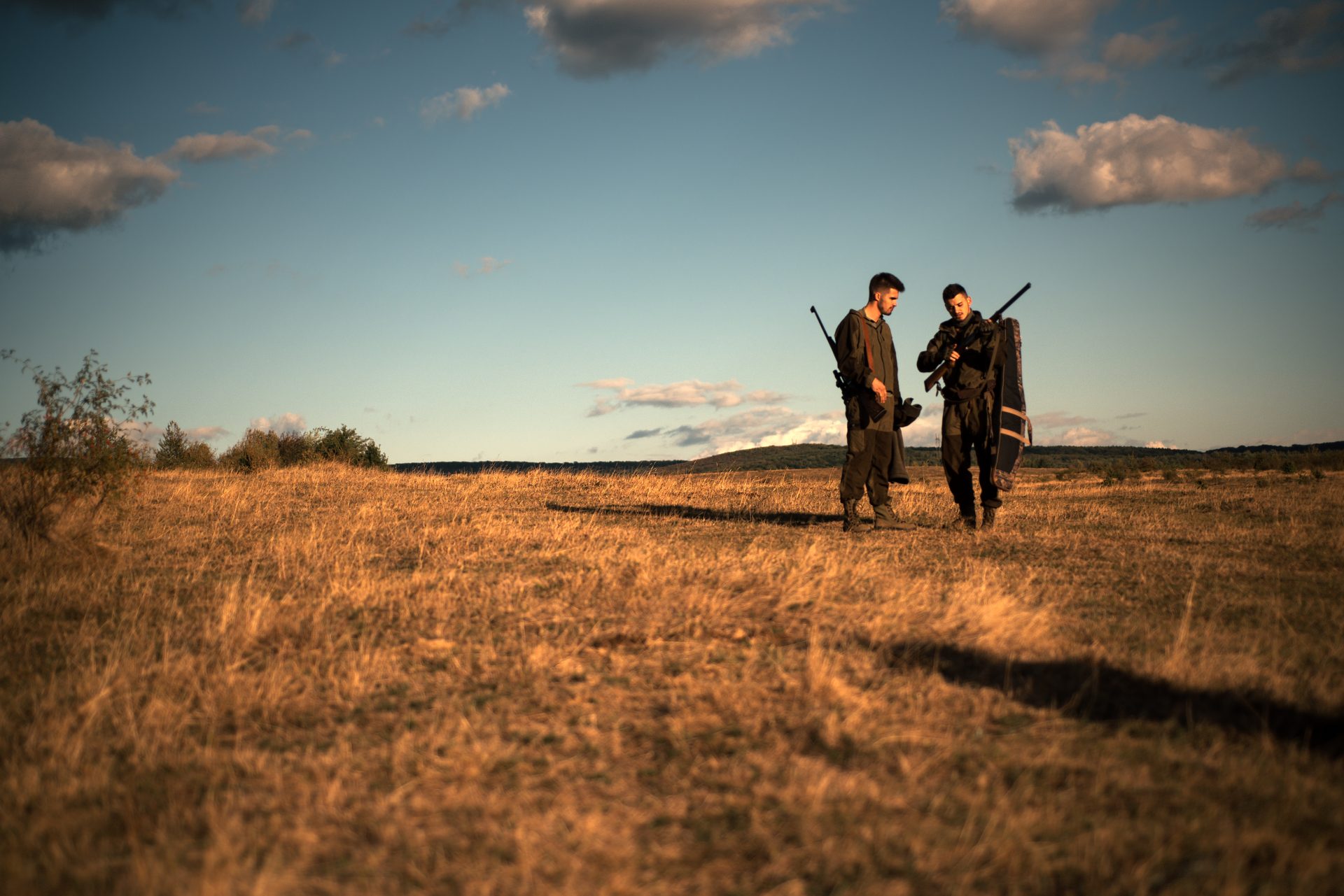 hunters-with-shotgun-gun-on-hunt-calibers-of-hunting-rifles-hunters-in-camouflage-clothes-ready-to